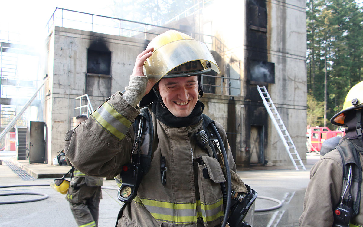 Deryck Lafortune takes a break following a firefighting demonstration at JIBC's Maple Ridge campus.