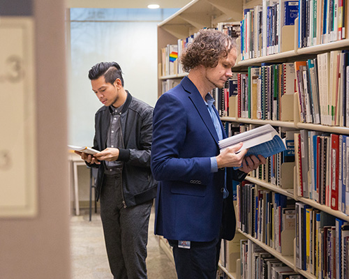 JIBC student & staff at the library